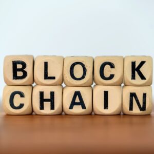 Close up word blockchain on wooden block