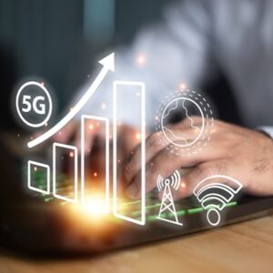5G network with person using a laptop computer