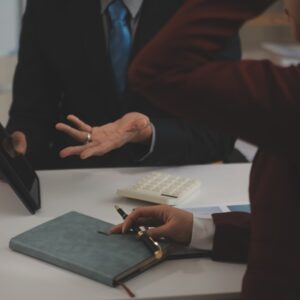 Audit concept,Administrator business man financial inspector and secretary making report calculating balance. Internal Revenue Service checking document.